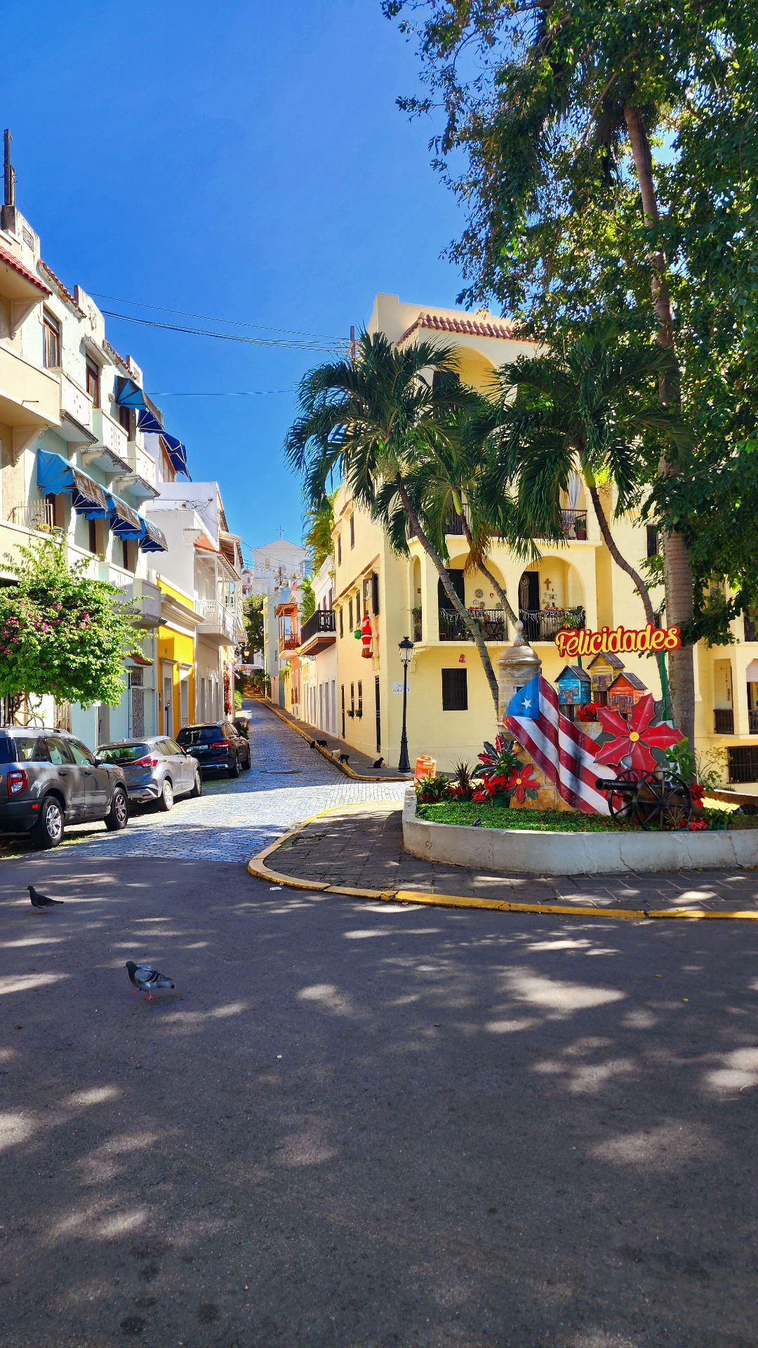 Blue cobblestone street in Old San Juan on a bright morning