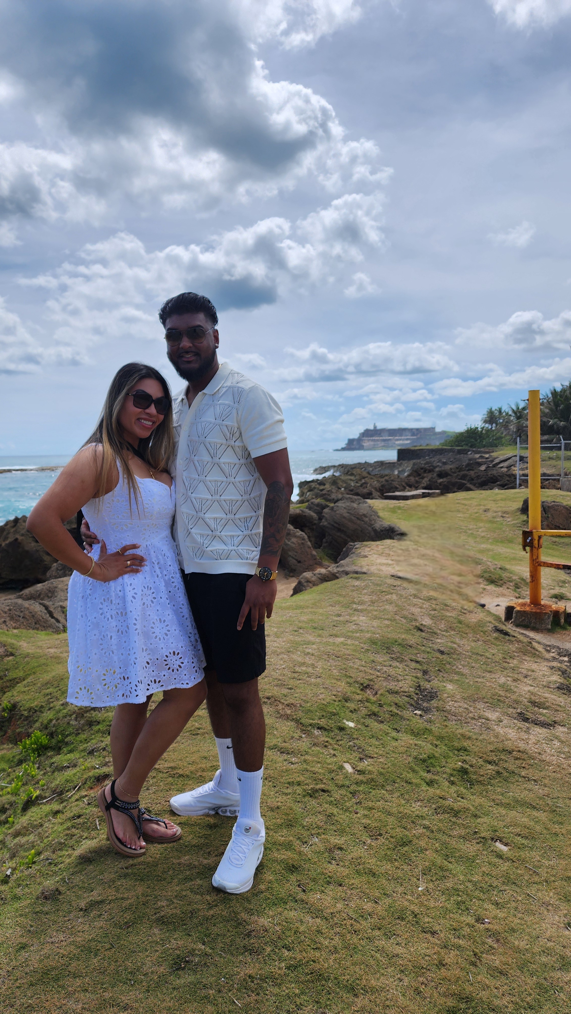 OnPoint Tours guests smiling at a scenic overlook along Puerto Rico's north coast.