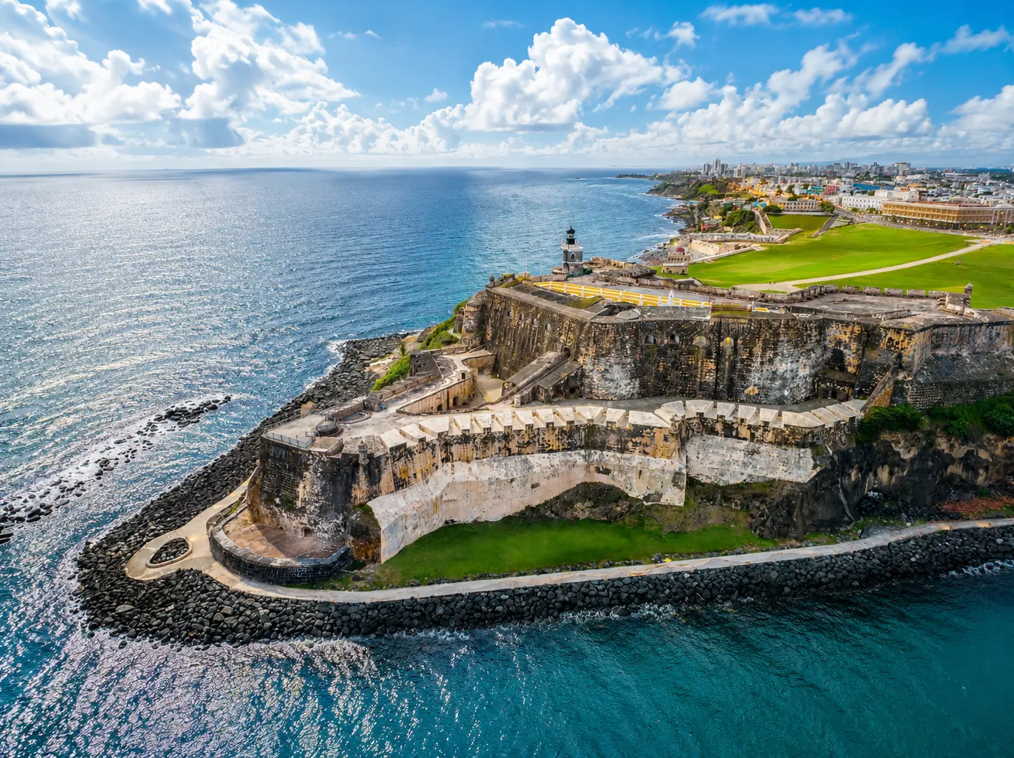 Turquoise Caribbean water and the historic waterfront of Old San Juan seen from the cruise pier